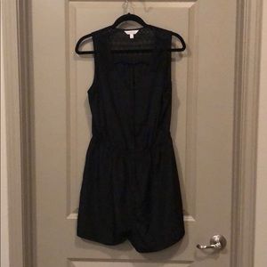 Black sleeveless romper with lace detail
